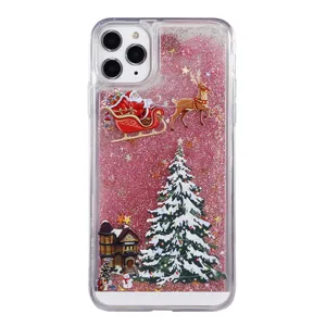Clear Christmas quicksand phone case with pink glitter, Santa and tree design for iPhone.