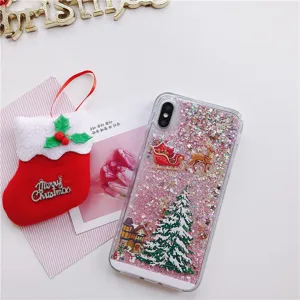 Christmas liquid glitter phone case detail featuring cute Santa, reindeer and snowy tree.