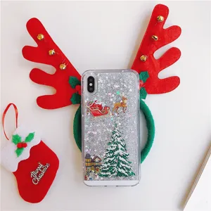 Christmas quicksand phone case with glitter snow scene, cute holiday protective cover for phone.