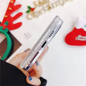 Transparent quicksand phone case bottom detail, precise cutouts, clear protective cover.