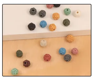Close up detail of colorful porous lava stone beads, perfect for DIY jewelry making and crafts.