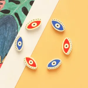 Colorful polymer clay evil eye beads for DIY jewelry making, handmade charm bracelets and necklaces.