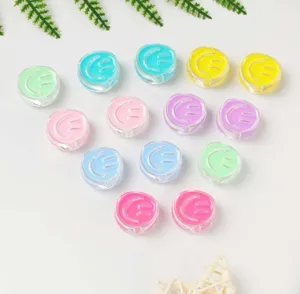 Translucent colorful acrylic smiley craft beads for DIY jewelry making details.