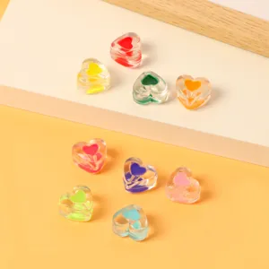 Cuentas sueltas de corazon de acrilico transparente de colores para joyeria DIY collares.