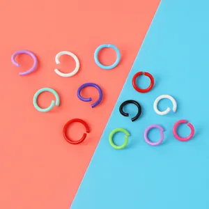 Colorful metal open jump rings detail shot, assorted color DIY craft accessories component.