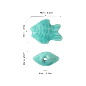 Perline sciolte di pesce in ceramica turchese per bracciali e collane fai da te.