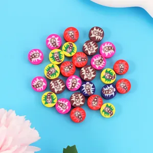 Detailed shot of colorful polymer clay caterpillar loose beads for DIY handmade jewelry.