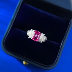 Close up of 925 silver lab grown pink sapphire emerald cut ring with delicate grid design