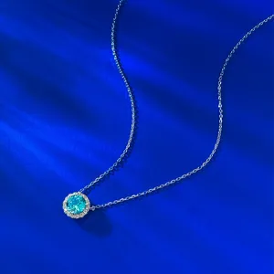 Exquise collier en argent S925 avec un pendentif rond étincelant de 7.0mm bleu Paraiba.