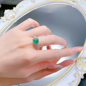 S925 Silber gruner Smaragd schliff Ring mit spiral verdrehtem Band fur elegante Damen Mode