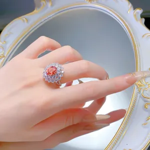 Eleganter 8x10mm ovaler Padparadscha Ring aus S925 Silber mit doppeltem Zirkonia Halo.