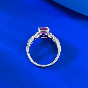 Detail shot of lab-grown pink sapphire 925 silver ring with delicate bowknot design.