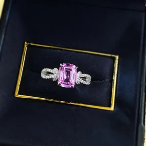 Exquisite lab grown pink sapphire ring detail, 925 silver cushion cut gem with bow.