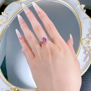 Gorgeous 925 silver pink sapphire ring featuring an elegant radiant cut stone and split pave band.