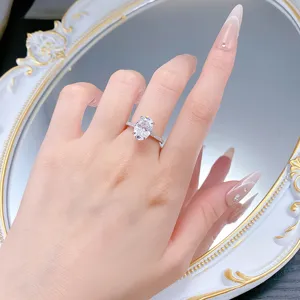 Exquisite 925 silver oval moissanite ring with pave band detail shot showcasing brilliant sparkle.