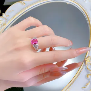 Exquisite 925 silver lab-grown pink sapphire rectangular ring with carved lattice design.