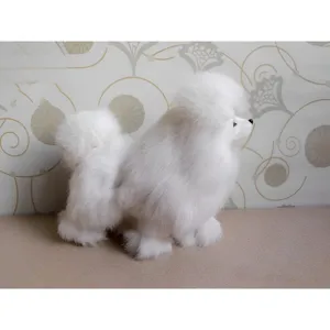 Detailed close-up view of the white simulation puppy plush toy, highlighting fluffy white fur texture.