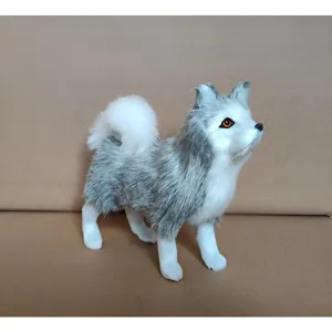 Simulation fluffy husky dog toy detail close up, cute grey white plush animal desktop ornament.
