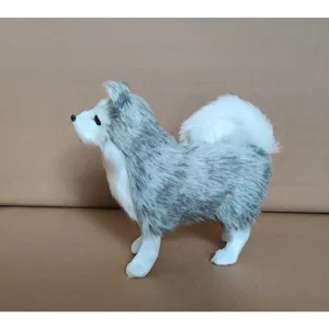 Close-up of fluffy grey and white simulation husky dog toy model, detailed fur texture.
