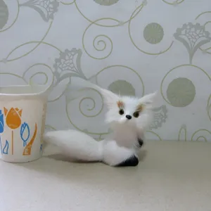 Detailed view of simulation white fox plush figurine home decor photography prop animal toy