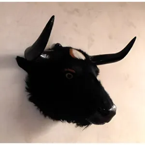 Black bull head wall decor, leather animal taxidermy sculpture for bar home interior design.