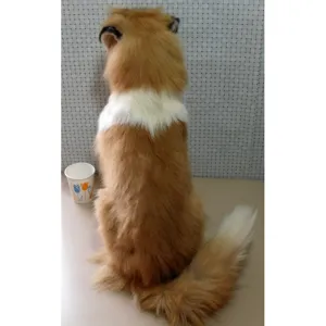 Detailed view of medium shepherd dog plush model toy, lifelike furry animal decoration prop.