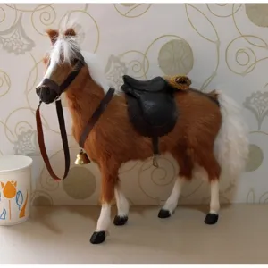 Detailed shot of simulation horse model with real goat fur, leather saddle, and bell.