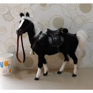 Simulation plush horse toy with realistic fur, saddle and reins, decorative animal figurine.