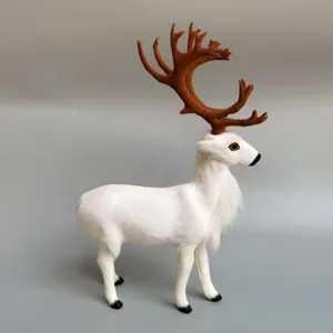 Detailed view of white faux fur reindeer figurine with brown antlers for home decor.