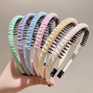 Colorful braided non-slip hair hoops with teeth for daily face washing and styling.