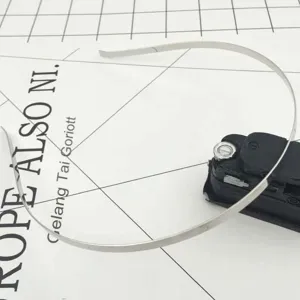 Metal headband base DIY hair accessory detail view, slim iron wire hoop crafting material.