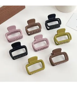 Matte finish square hair claw clips detail shot, showing multiple colors and durable structure.
