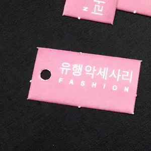 Pink rectangular paper hang tag with punched hole, cute fashion accessories label card for clothing.