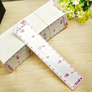 Hair accessory paper card display hanging tag packaging card with pink heart pattern.