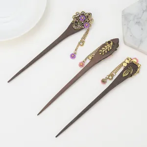 Handmade wenge wood hair sticks with vintage metal floral carvings and cute dangling tassels.