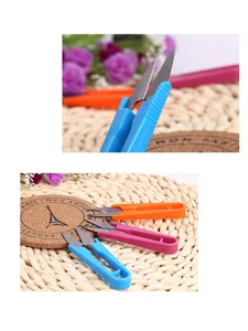 U-shaped thread scissors for sewing, durable stainless steel blades with ergonomic plastic handles.
