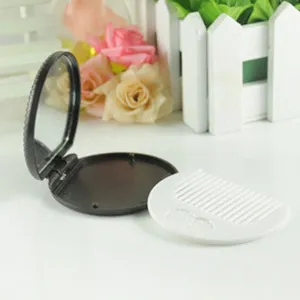 Portable chocolate cookie compact folding makeup mirror and matching white round comb set.