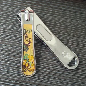 Stainless steel large nail clipper with floral pattern, durable manicure tool detailed view.