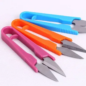 Portable U-shaped yarn scissors, colorful thread snips for sewing and craft trimming tasks.