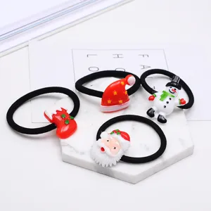 Christmas hair ties set featuring cute Santa Claus, snowman, hat and stocking resin charms.