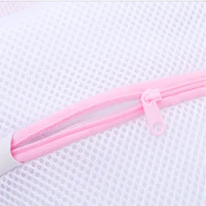 Durable white mesh laundry bag with pink zipper fine mesh design for underwear and delicate garments.