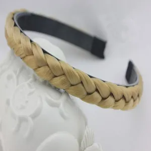 Close-up detail of synthetic blonde braided headband with black plastic base for daily wear.