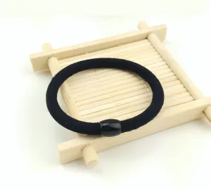 Laccio per capelli nero in nylon spesso con perla, elastico resistente per uso quotidiano.