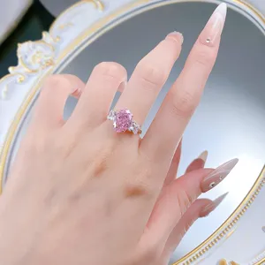 Elegant S925 silver oval pink high carbon diamond ring with sparkling accent stones sweet style