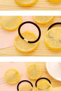 Detailed view of sweet style lemon slice hair ties, fresh fruit design black hair bands for girls.