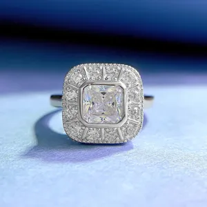 Close-up of 925 silver square simulated diamond ring with stunning halo setting.