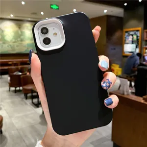 Matte black silicone phone case with contrasting white camera frame for iPhone daily protection.