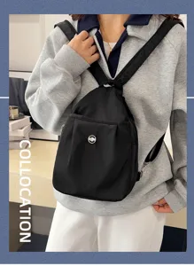 Damen schwarzer Nylon Rucksack vielseitige Umhängetasche lässiger Tagesrucksack für Alltag.