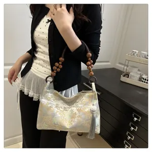 New Chinese style embroidered shoulder bag, retro tassel handbag for women, elegant commuter purse.