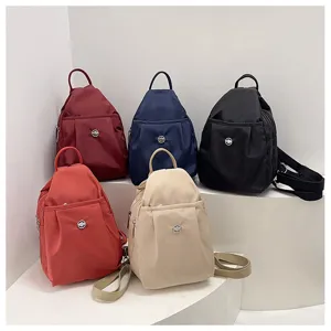 Details zum mehrfarbigen wasserdichten Nylon Mini Rucksack für Damen, kompakt und schön.